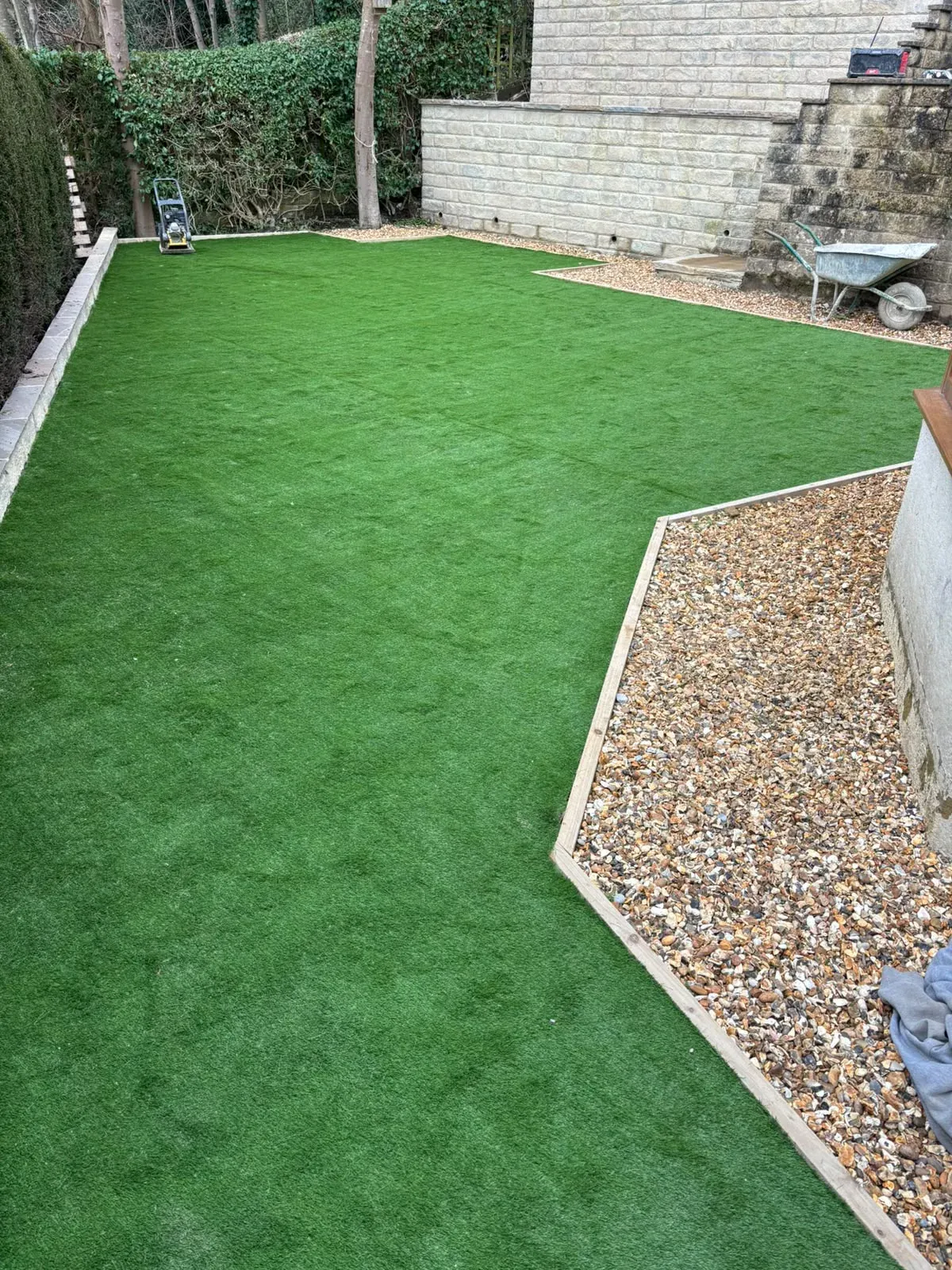 Artificial grass gravel border completed by Crown Hill Contracting