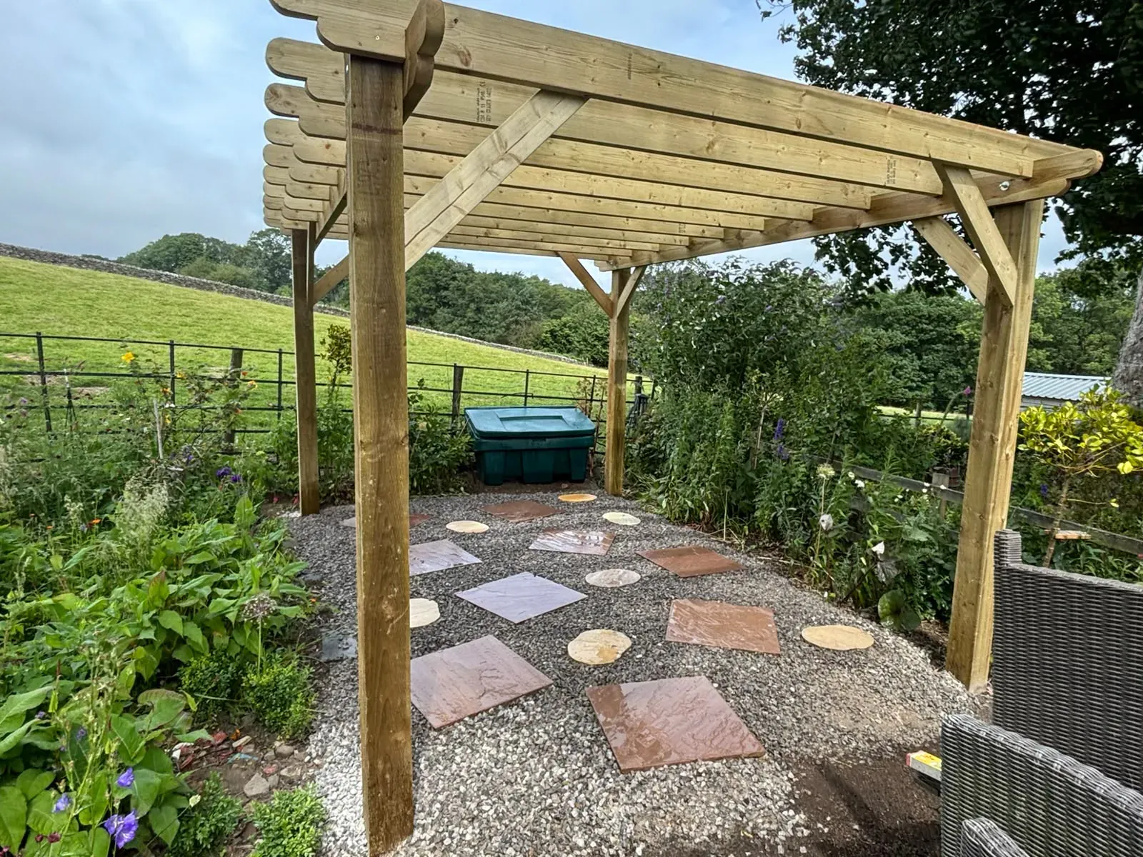 Covered sandstone patio completed by Crown Hill Contracting