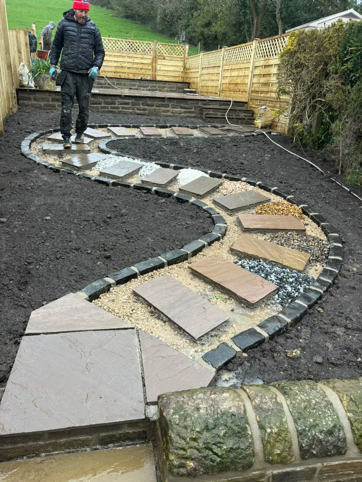 Curved stepping stone path completed by Crown Hill Contracting
