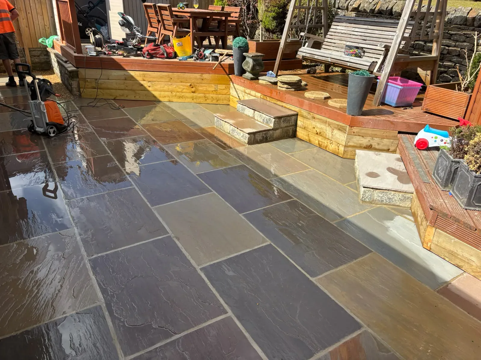 Dark porcelain patio completed by Crown Hill Contracting