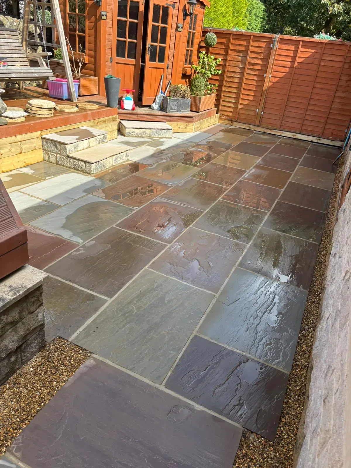 Dark porcelain paving completed by Crown Hill Contracting