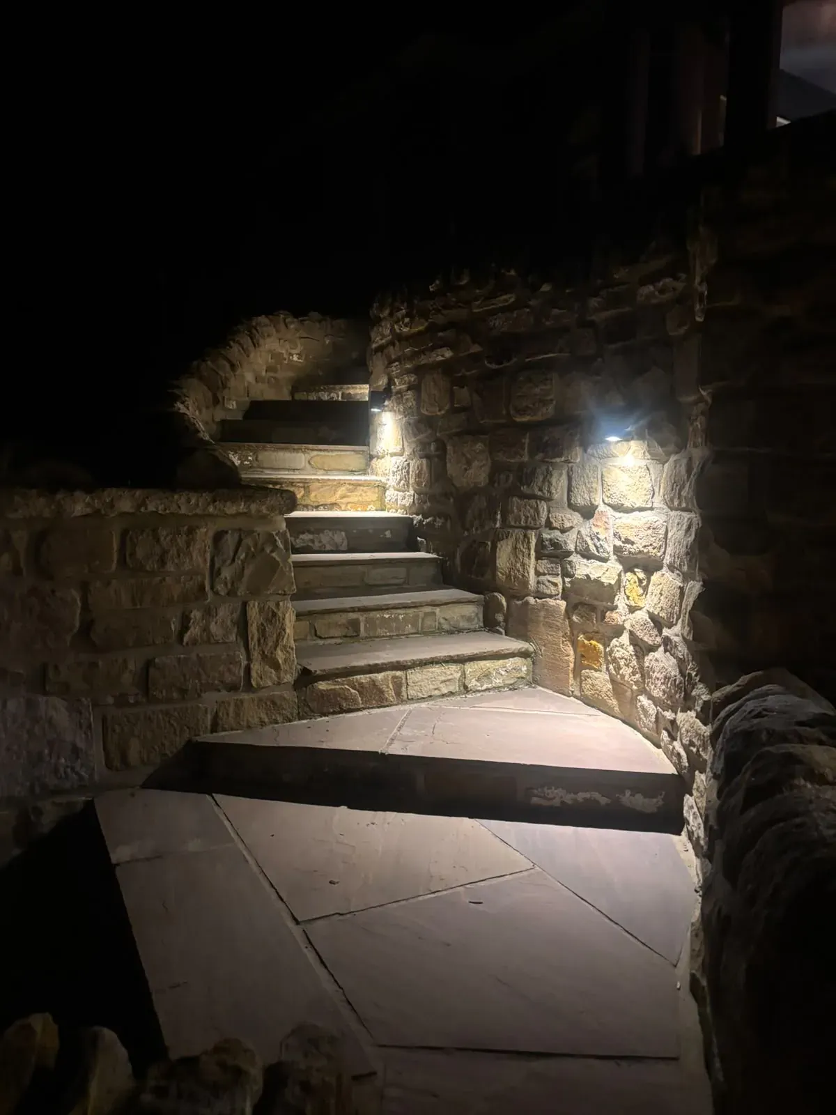Illuminated stone steps completed by Crown Hill Contracting