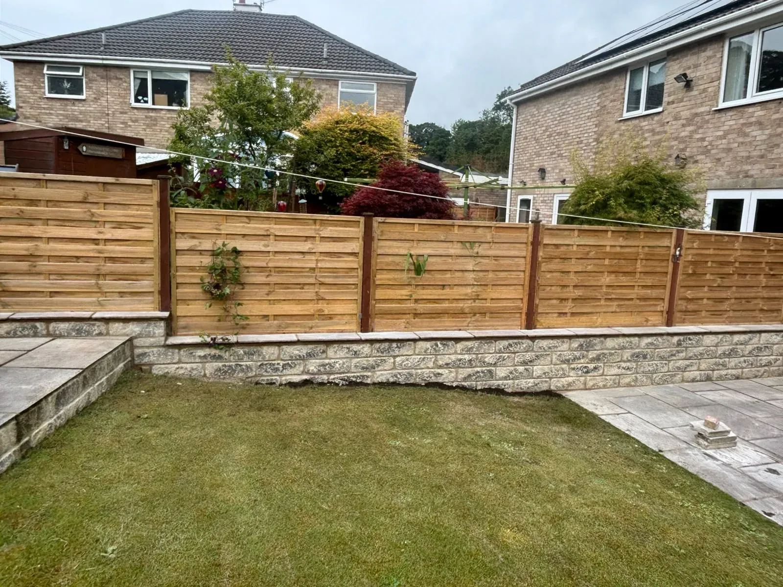 Landscaped garden timber fence completed by Crown Hill Contracting