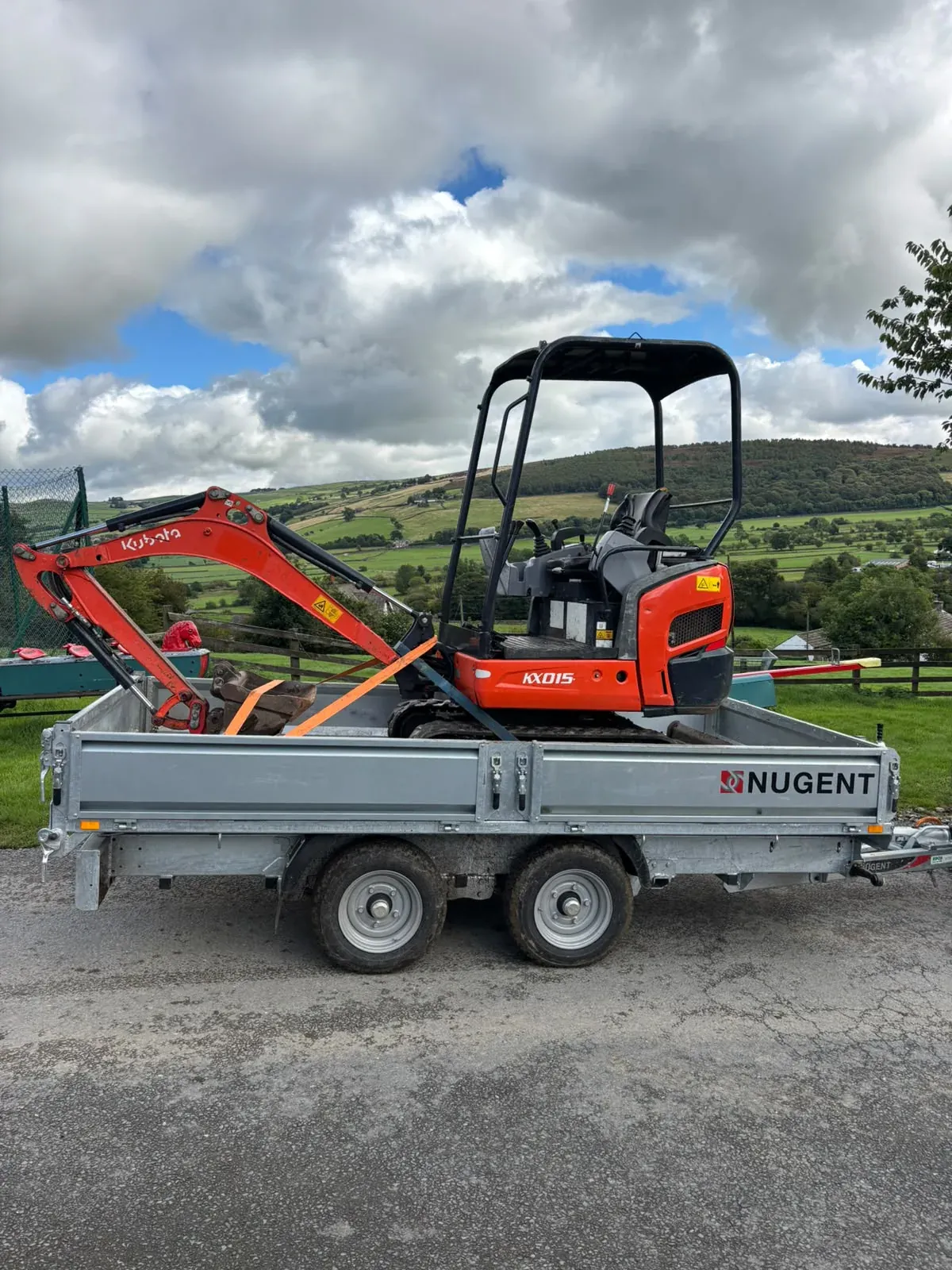 Mini digger landscaping site completed by Crown Hill Contracting