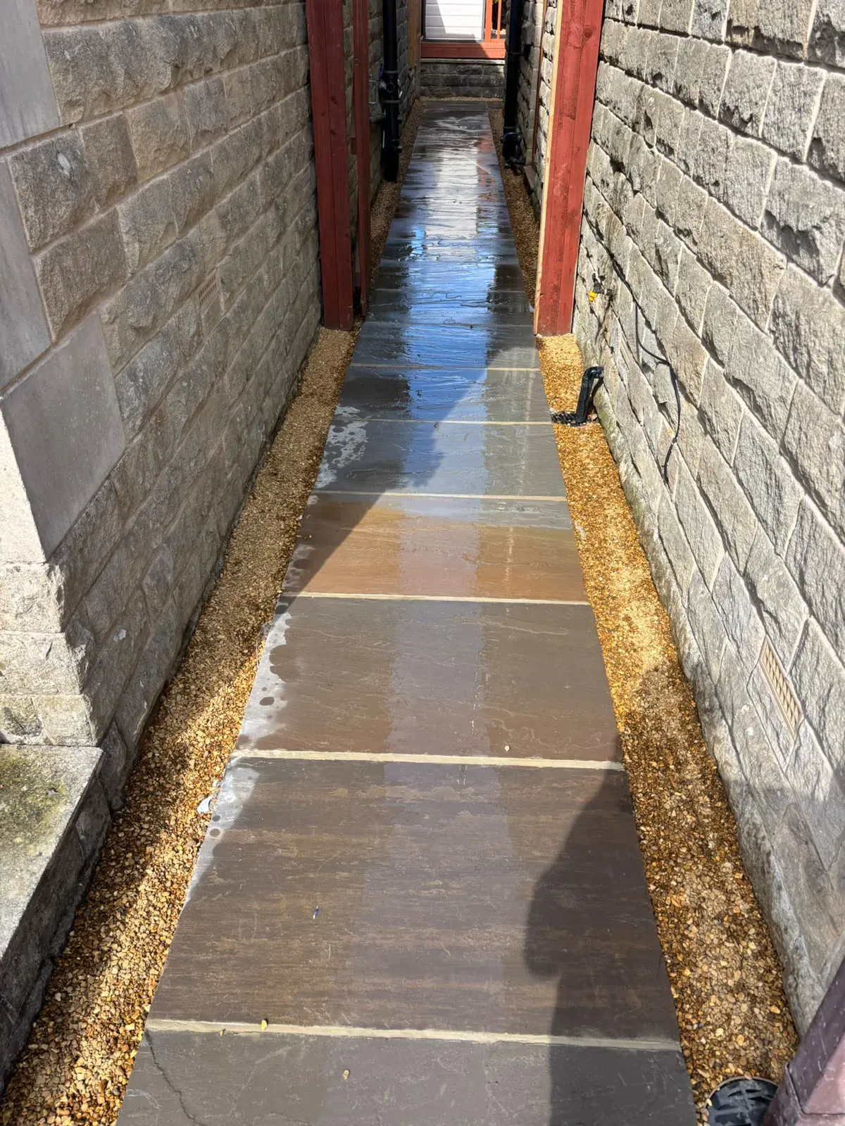 Porcelain paving sunroom completed by Crown Hill Contracting