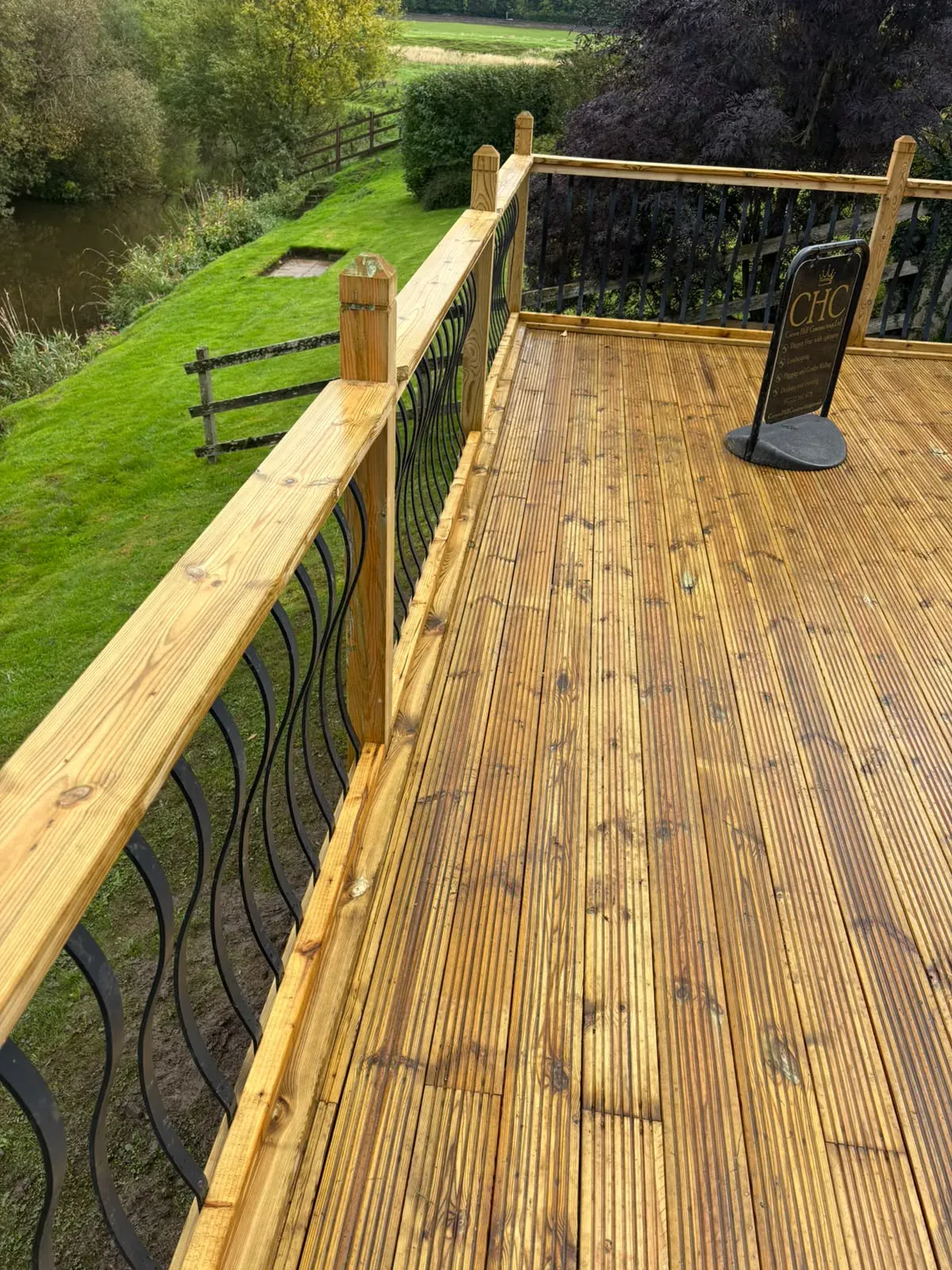 Raised timber deck wide view completed by Crown Hill Contracting