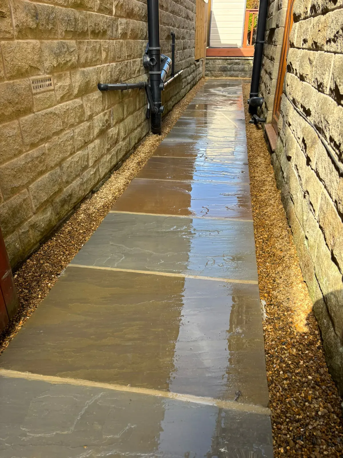 Sandstone path stone house completed by Crown Hill Contracting