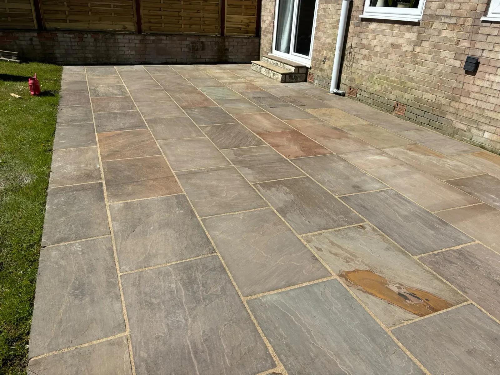 Sandstone paving terrace completed by Crown Hill Contracting