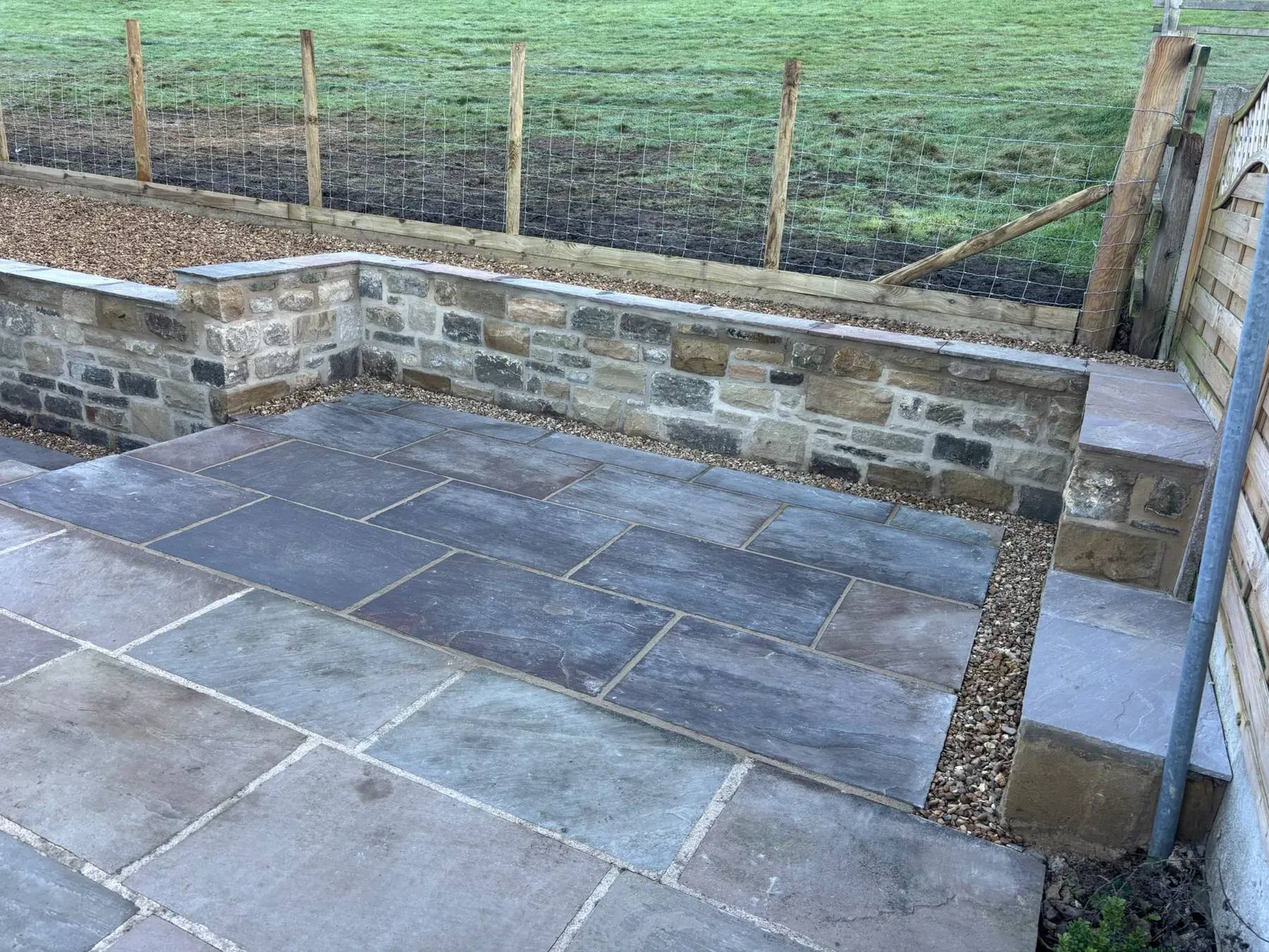 Slate patio stone steps completed by Crown Hill Contracting