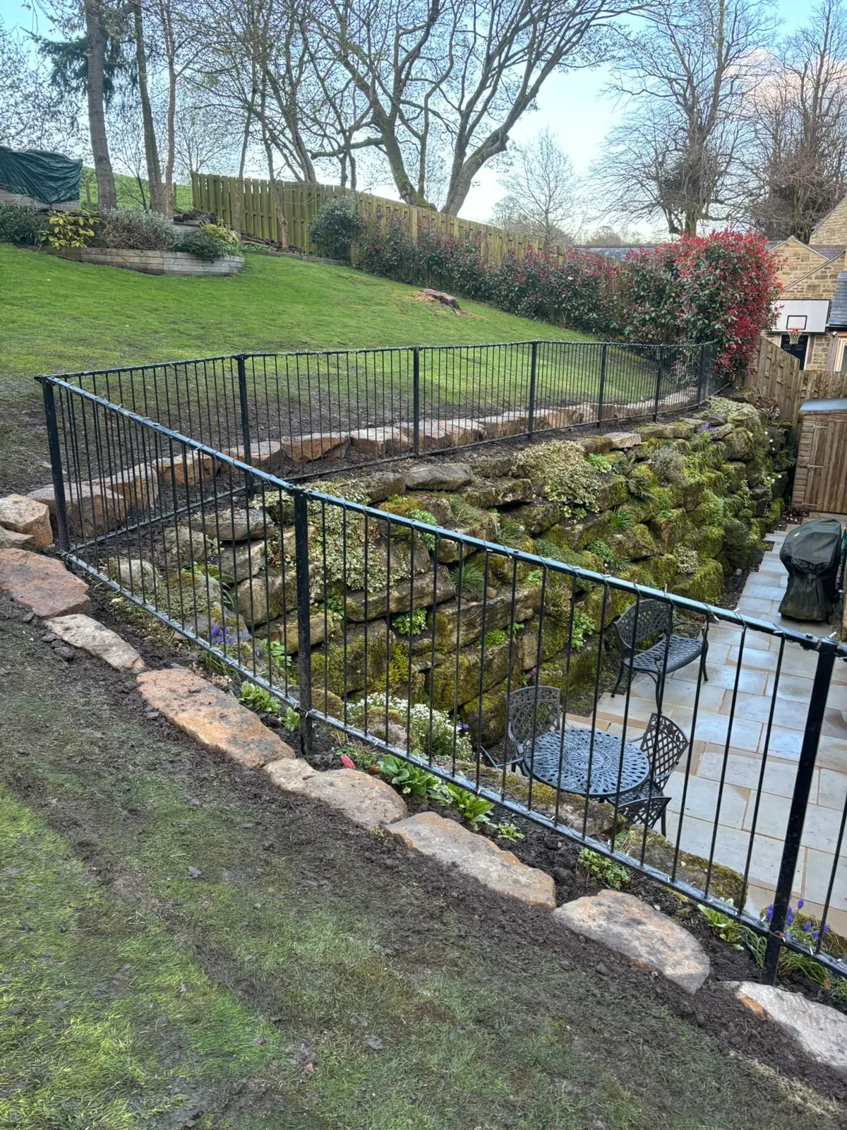 Stone wall rural garden completed by Crown Hill Contracting