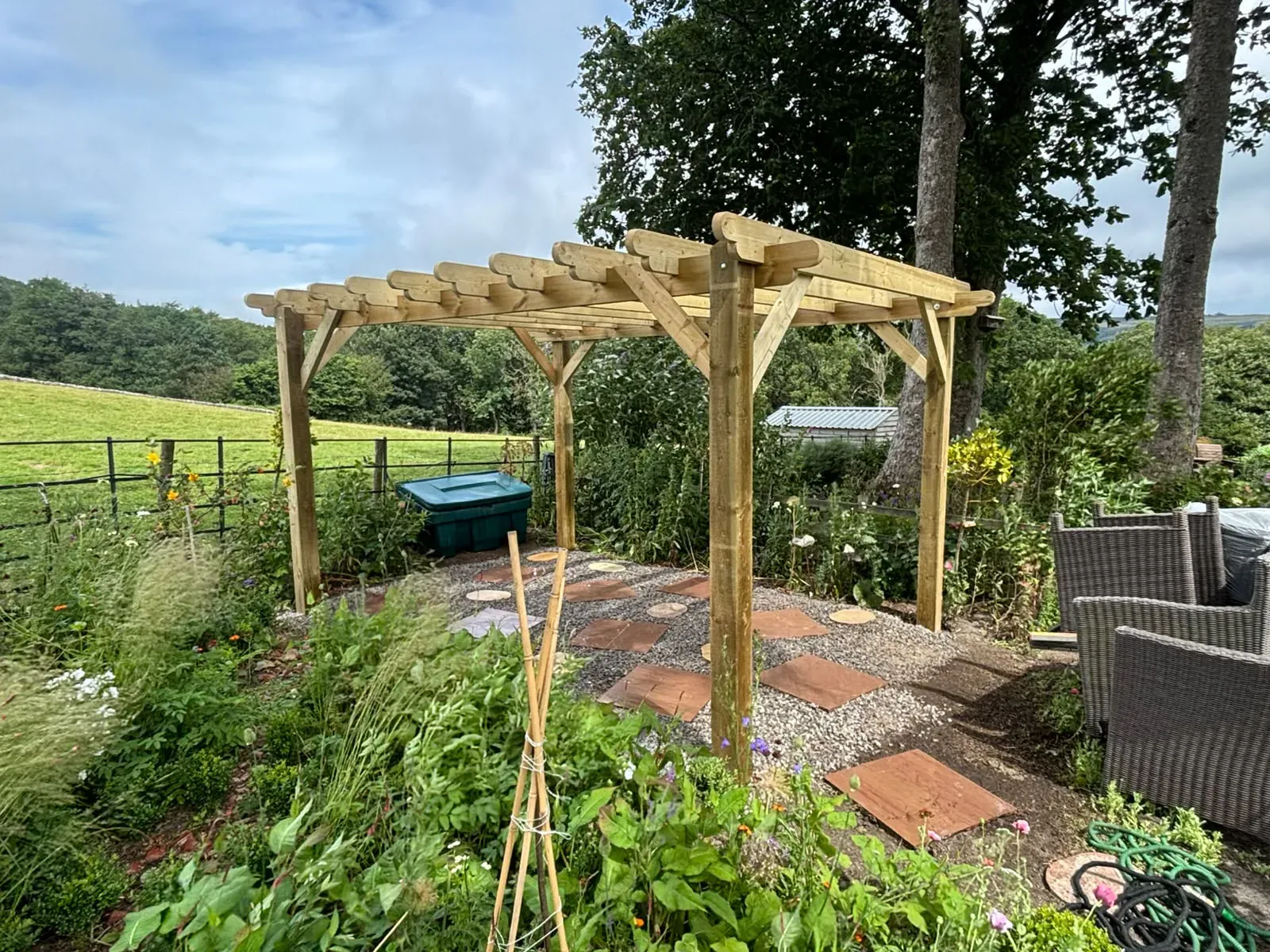 Timber pergola landscaped garden completed by Crown Hill Contracting